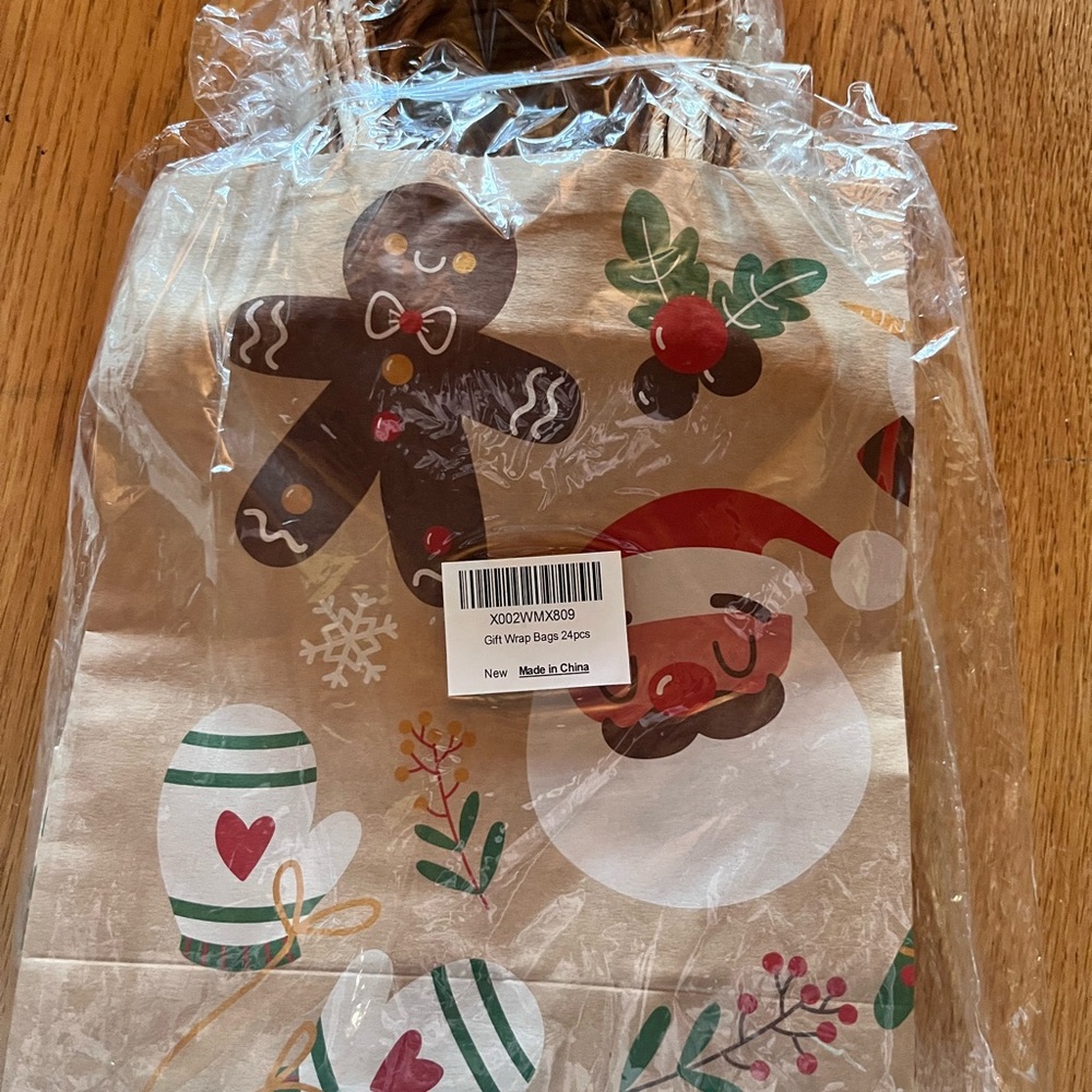 Festive Holiday Gift Bags with Gingerbread and Santa Design